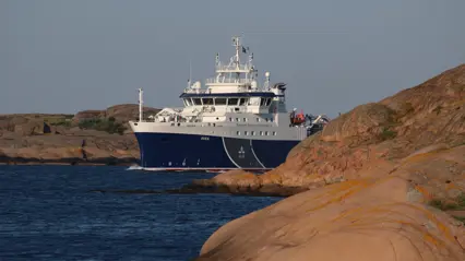 A smaller ship in an archipelago
