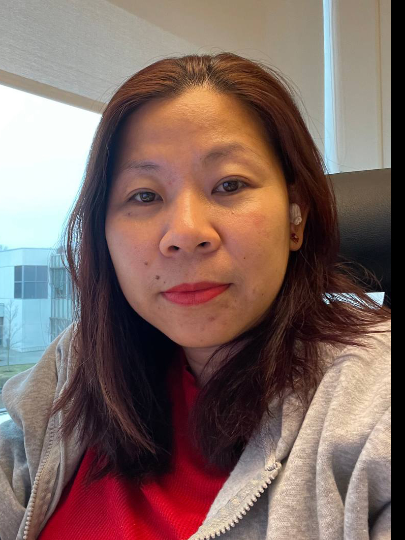 A woman by a window. Photo. 