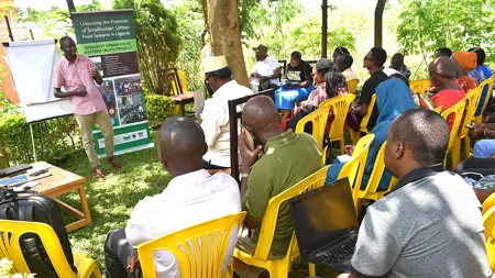 People listening to a presenter