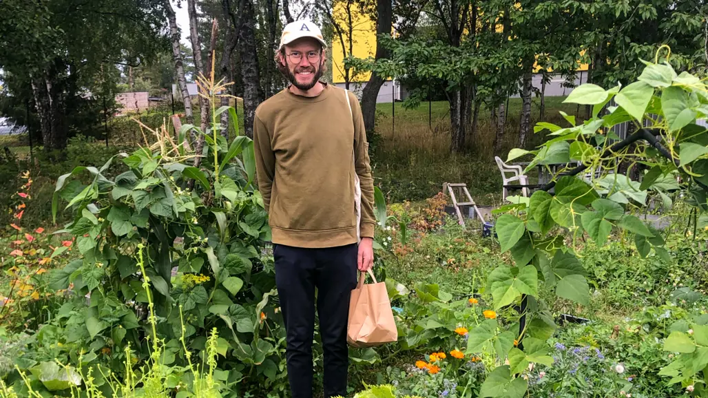 A man in a garden. Photo.