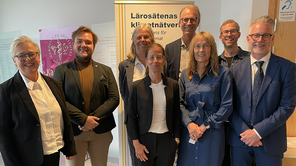 De åtta personer som utgör värdkonstellationen