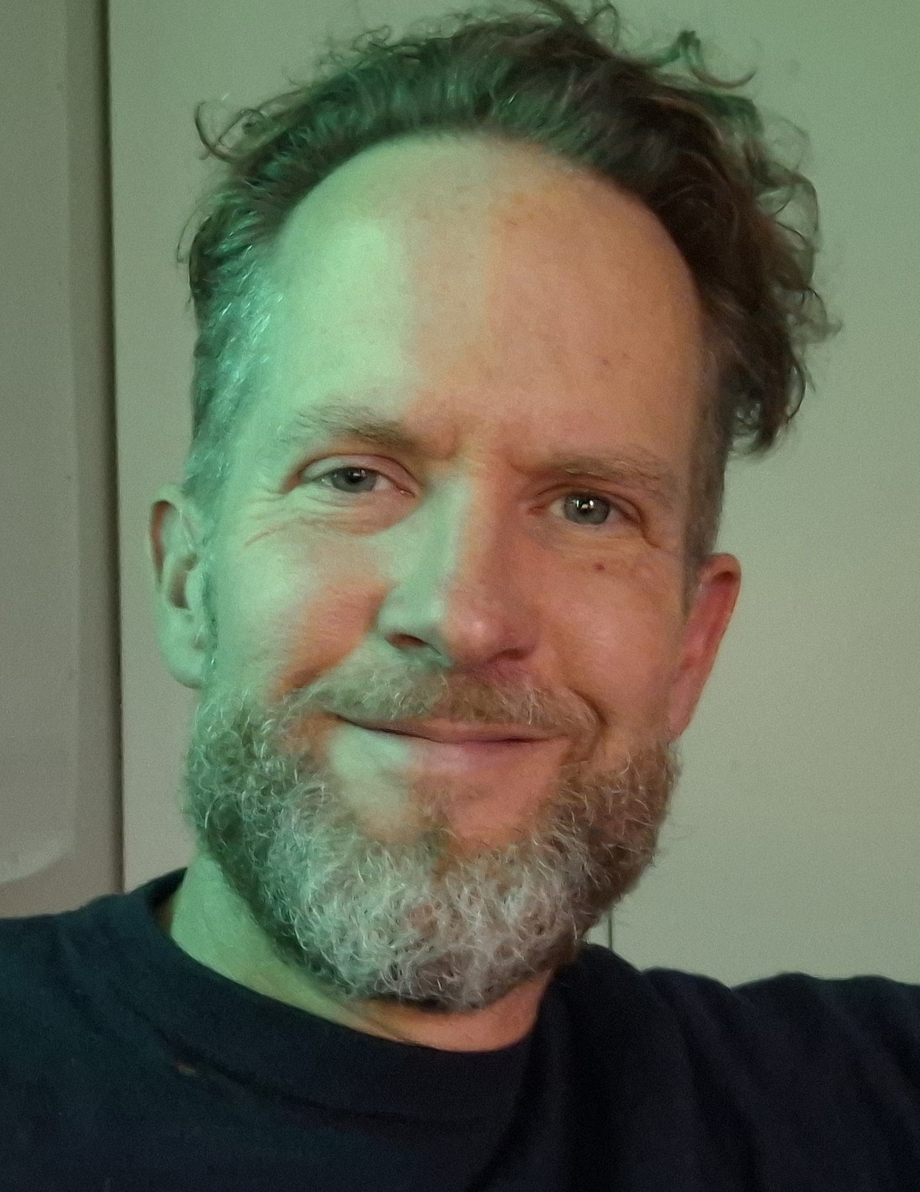 Porträttfoto av David Agar