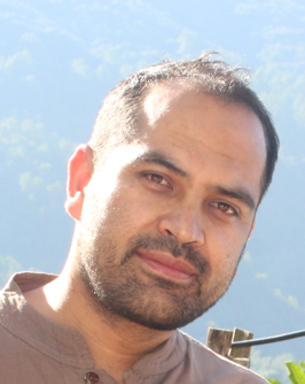 Portrait photo of Binod Adhikari