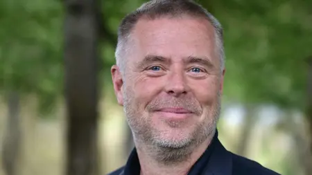 Porträttbild på Magnus J. Stark
