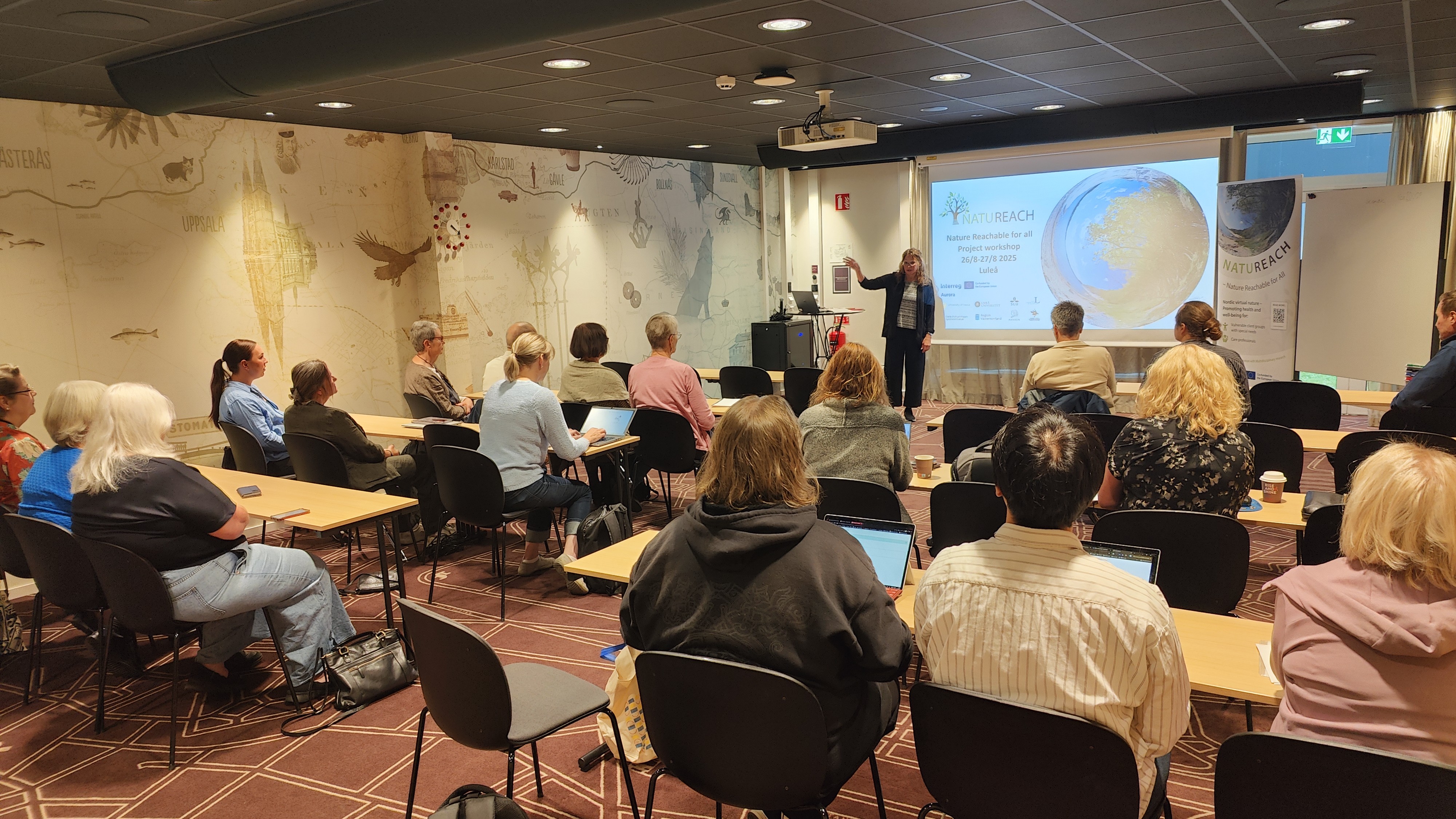 In conference room with speaker