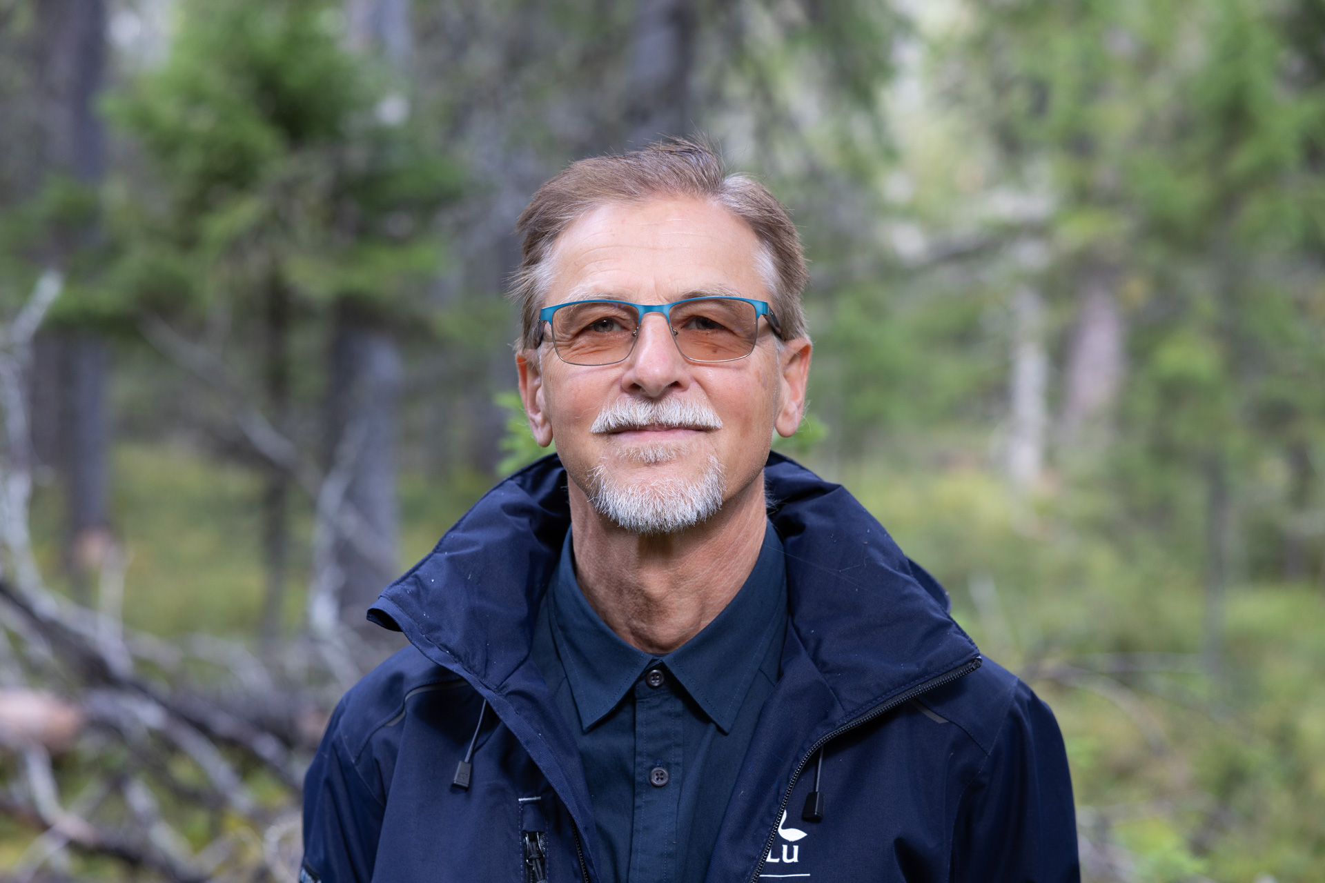 Picture of a man in a forest.