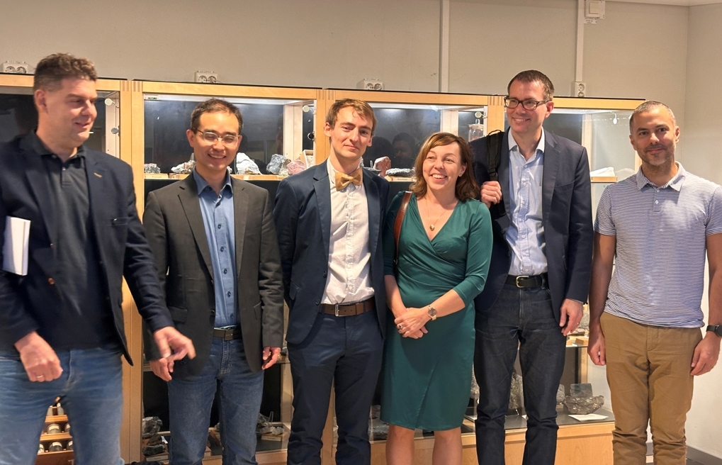 Six happy and proud people