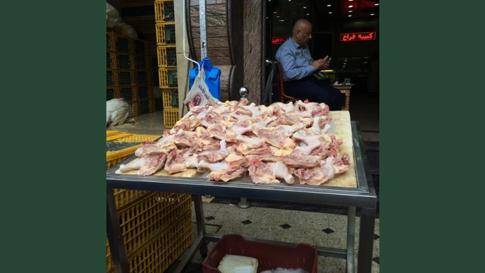Photo of cut up meat in grocery store.