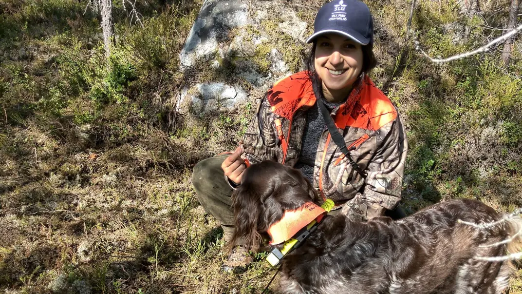 Phd-student Desirée Guidobaldi Stenbacka with her dog. Photo.