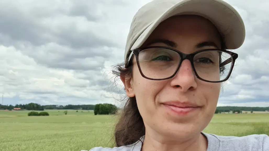A selfie of a woman on a field. Photo.