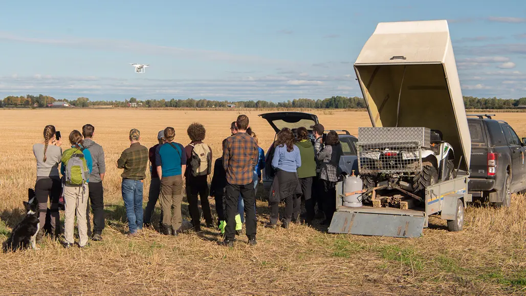 A group of people at a field.