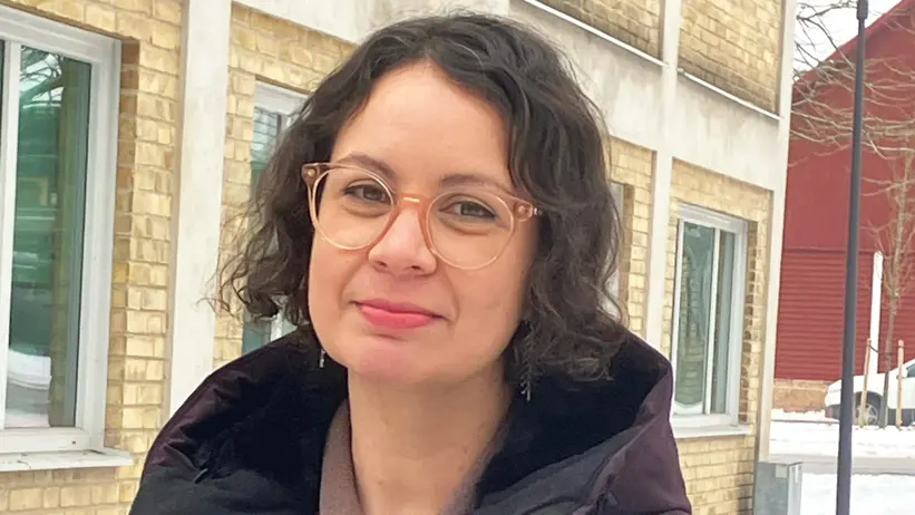 A woman with a winter coat. Photo.