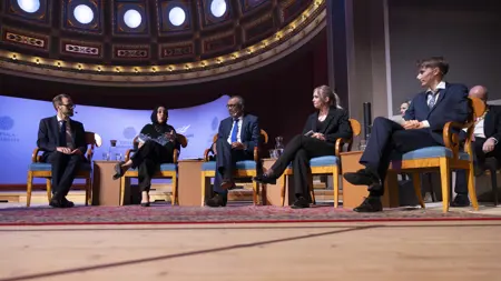 Five persons on stage