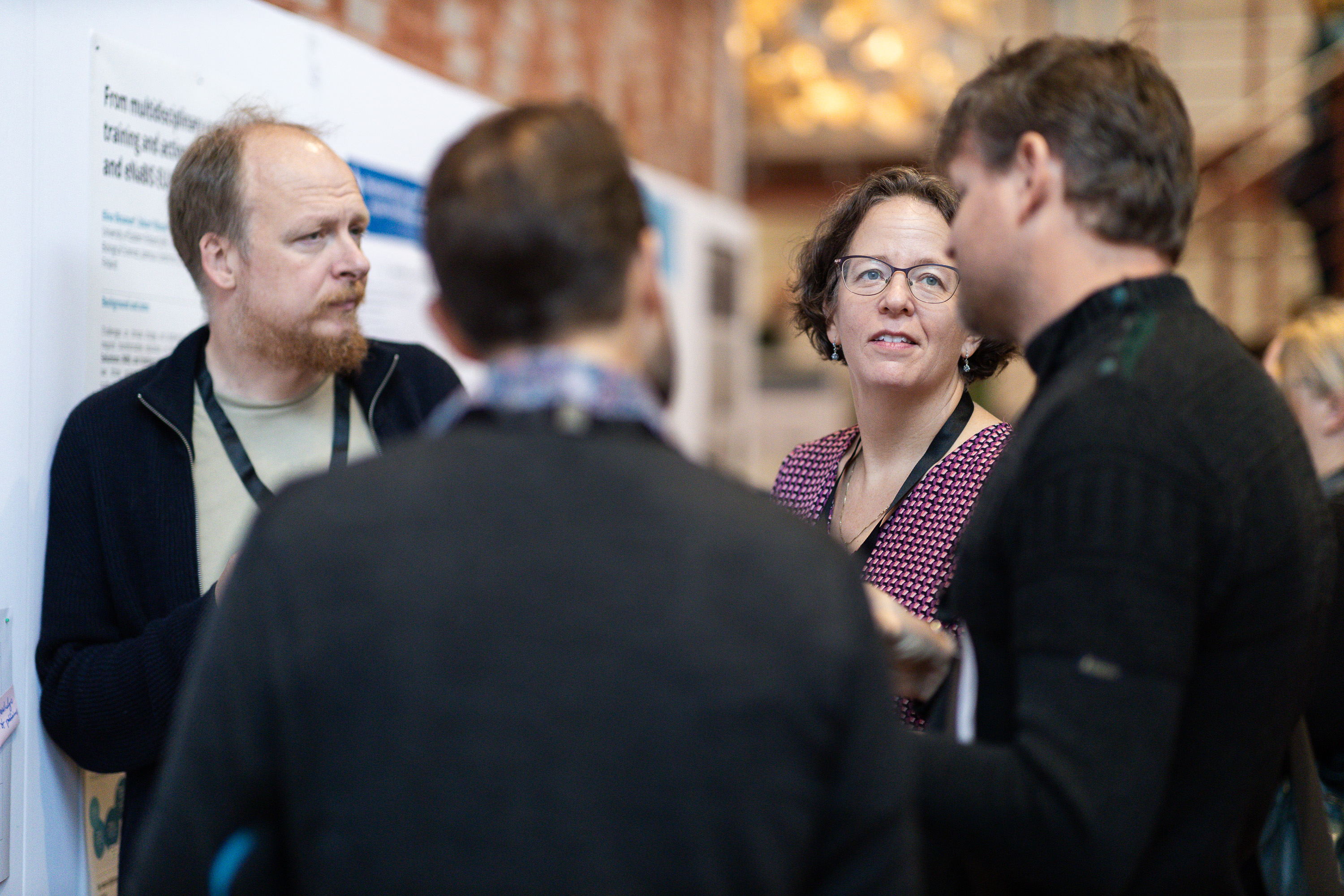 A group of people are discussing. Photo.