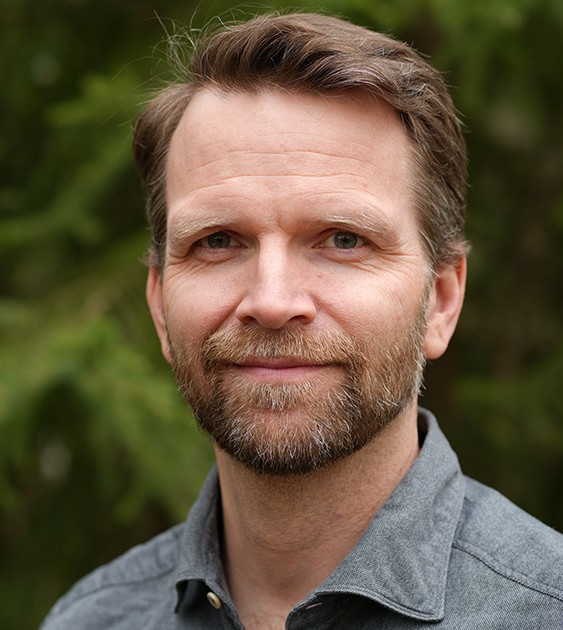 Porträttfoto av Ola Lindroos