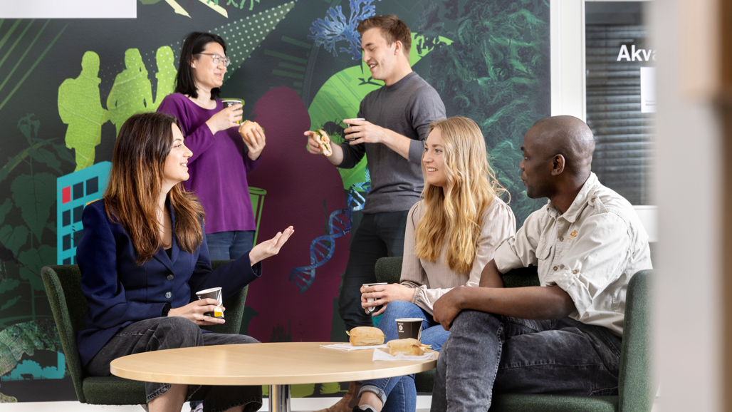 Students talking around a table