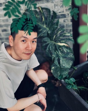 Porträttfoto av Zhengdong Sun