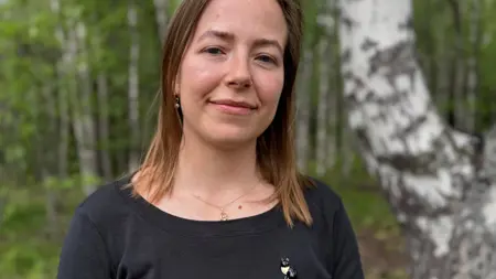 Portrait of woman smiling.