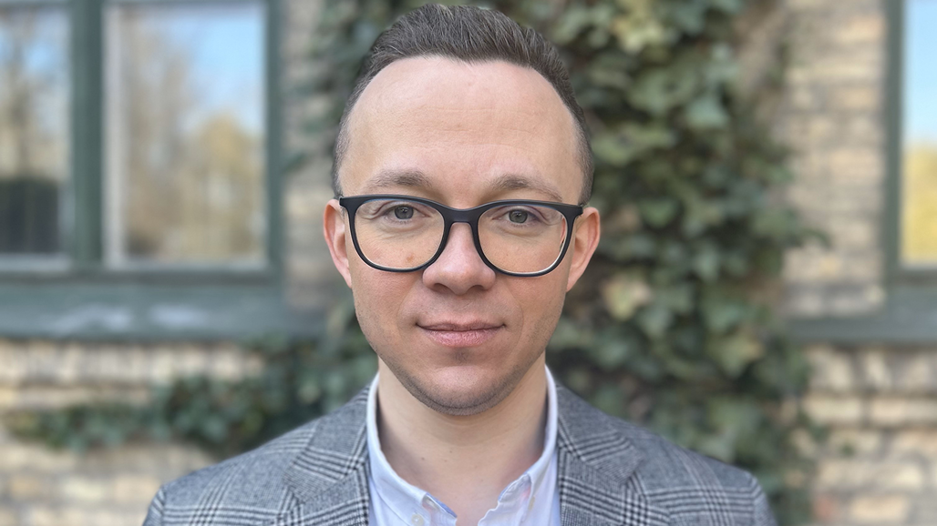 Porträttfoto av Oleksiy ”Alex” Guzhva.