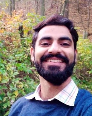 Porträttfoto av Hateem Ul Ghani