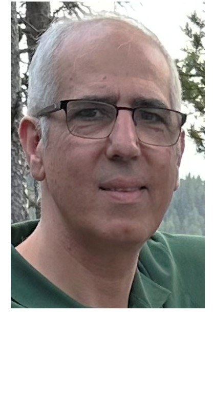 Porträttfoto av Saeid Karkehabadi