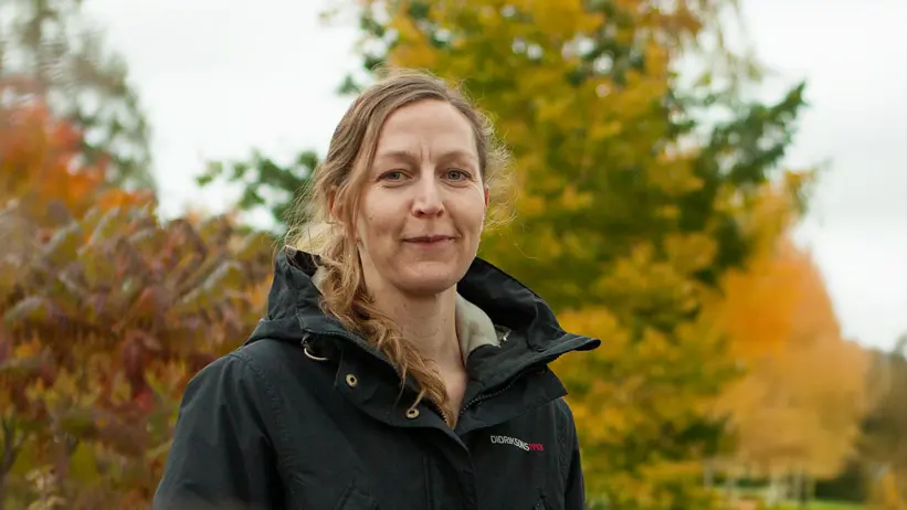 A woman outdoors. Photo.