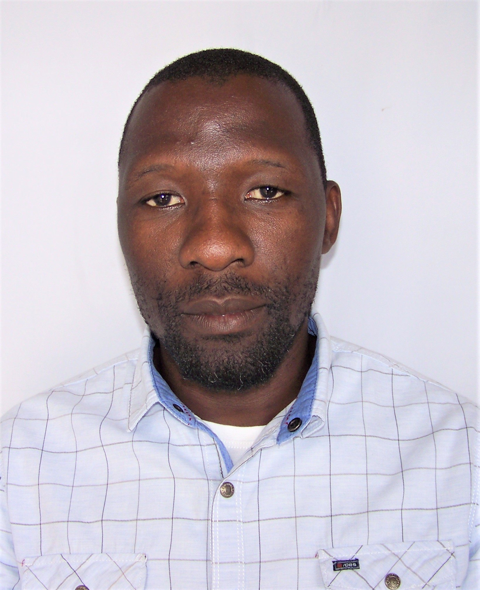 Porträttfoto av Arménio Cangela