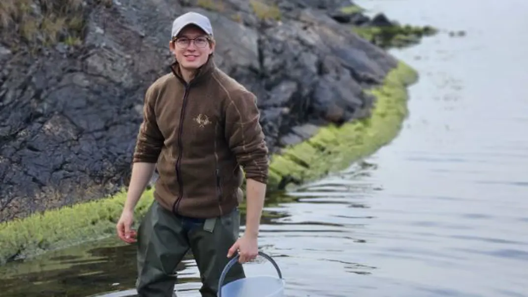 Oscar Juvall takes an algae sample