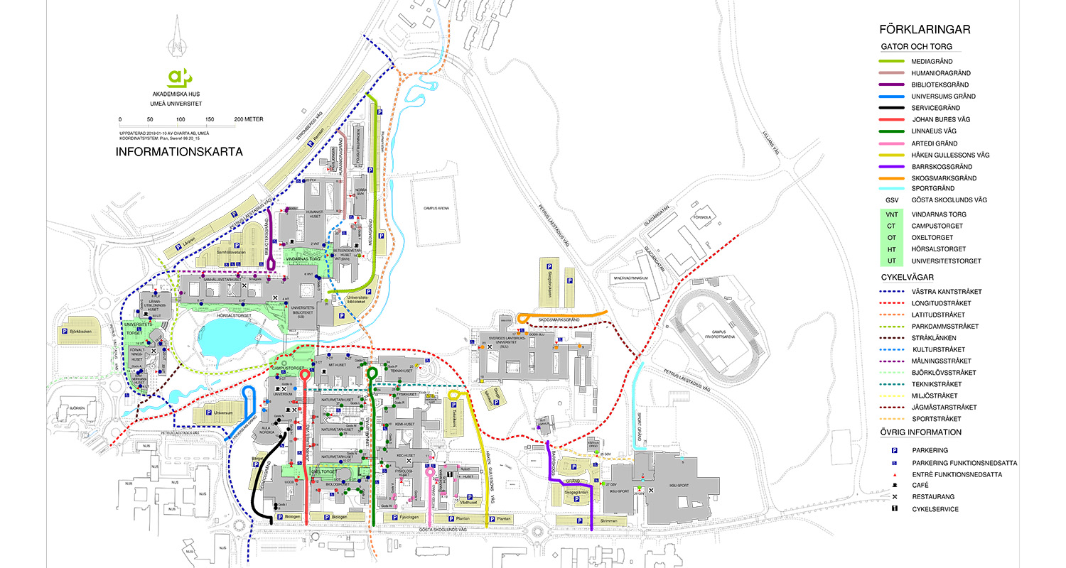 A detailed map of a campus area with various buildings and roads marked with color-coded lines. The map includes a legend explaining different colors and symbols representing roads, walkways, cycle paths, and other facilities. A lake and green areas are also visible on the map.