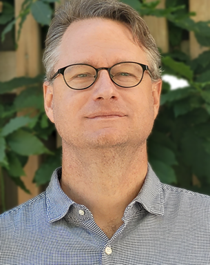 Porträttfoto av Brian Kuns