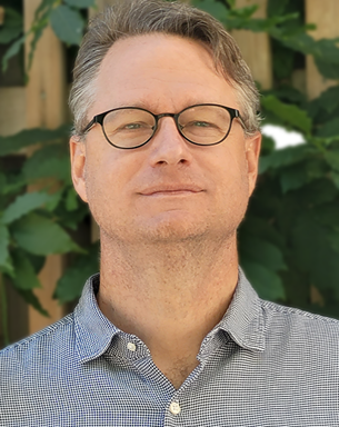 Porträttfoto av Brian Kuns