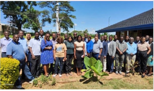 A group of people gathered for photo. 