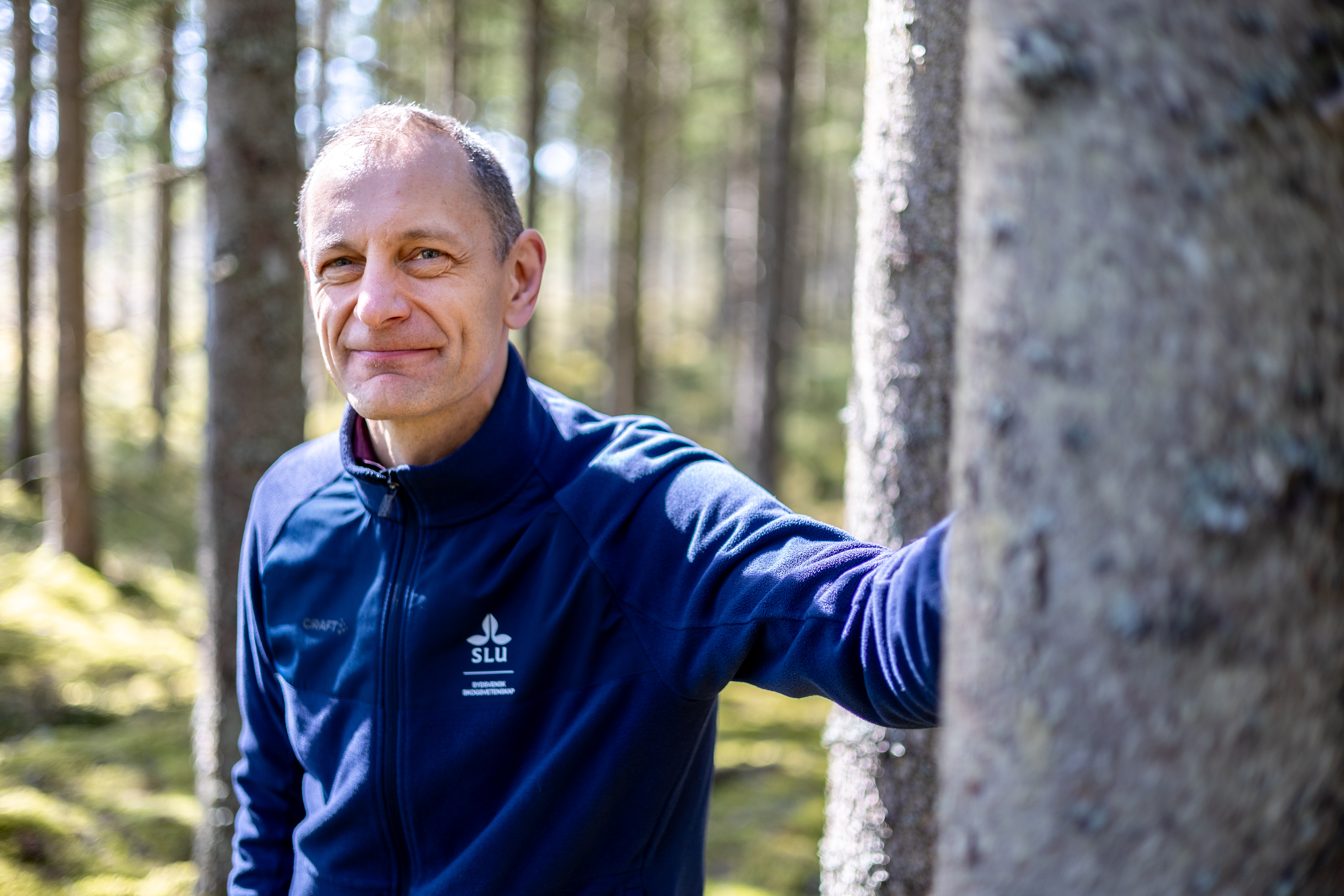 man standing in the forest