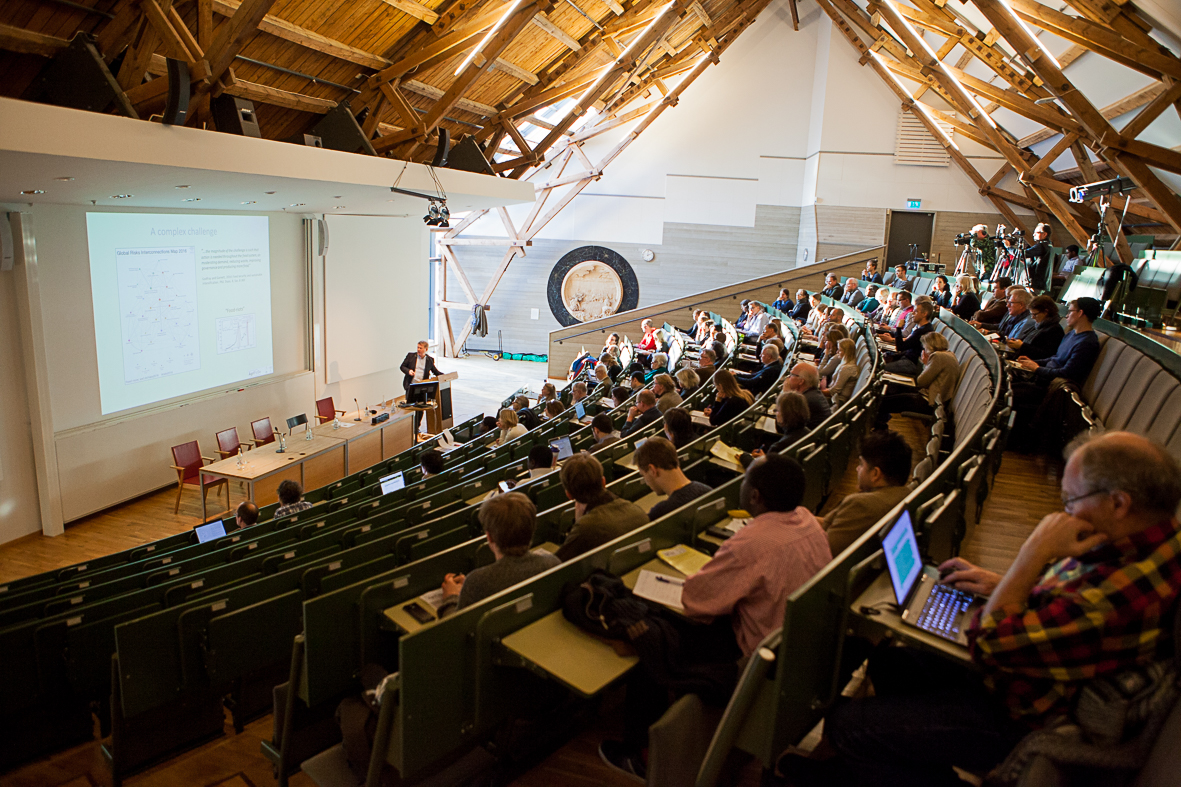 a lecture hall with audience