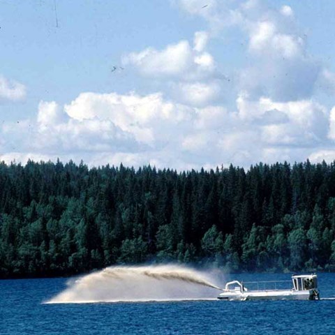 Liming of lake. Photo