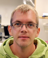 Portrait photo of a man indoors. Photo.