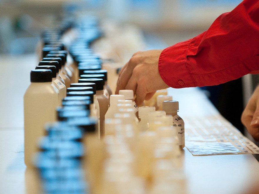 Samples in plastic bottles in a laboratory. Photo. 