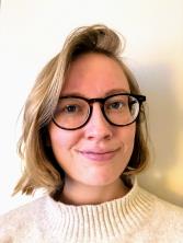 Portrait photo of a smiling blonde woman. Photo. 