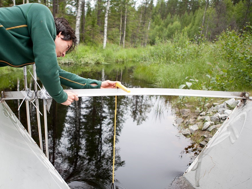 Engineer measuring water