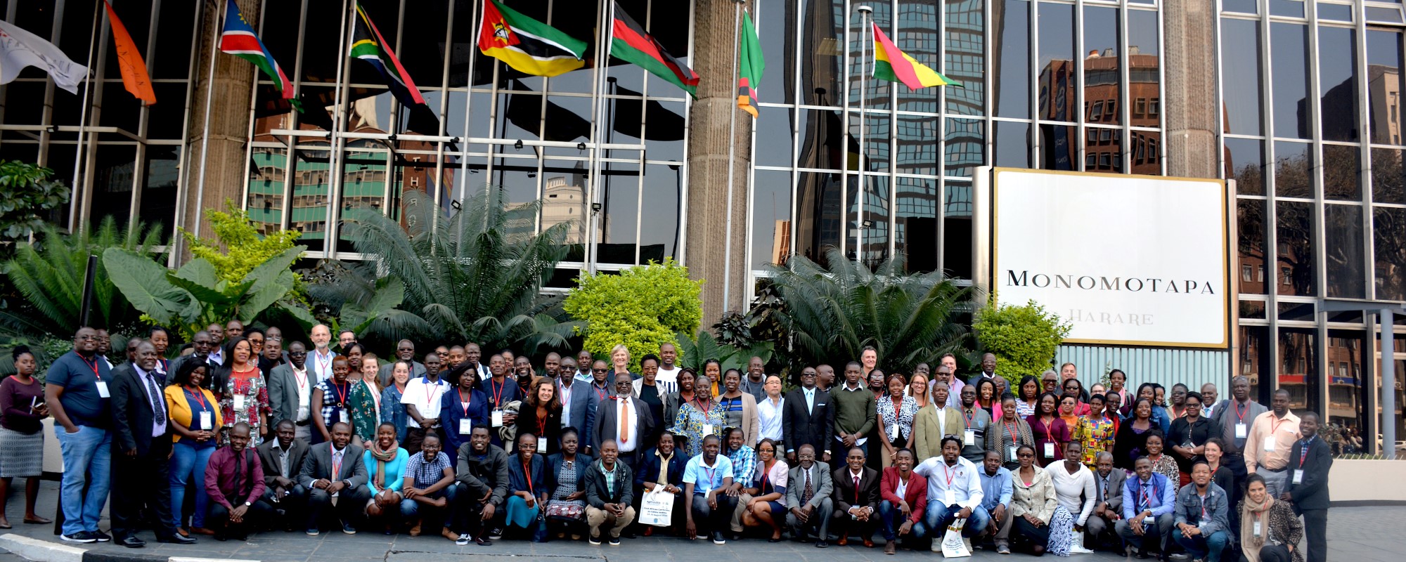 Group of people gathered in front of building