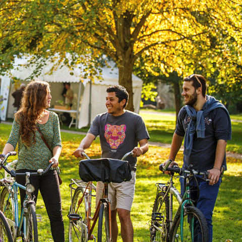 Three student with bikes