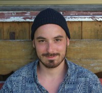 Young man with a cap.