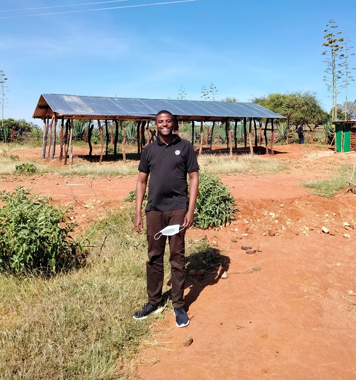 Jeff Wamiti in front of an empty storage in drylands Kenya