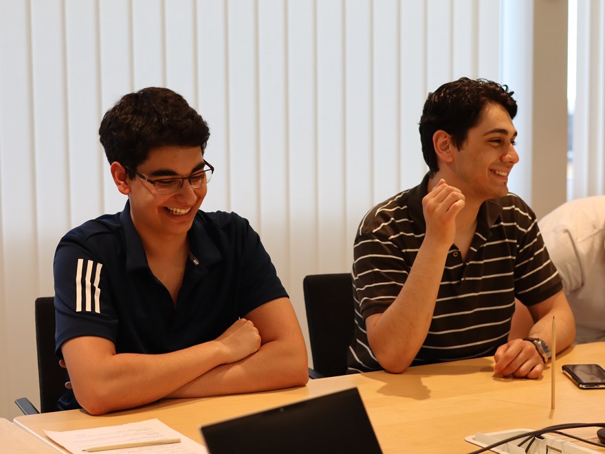 Two students at a table