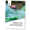 A report cover with a ladybird. Photo.