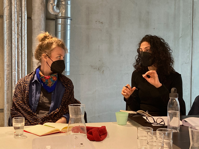 People talking with face masks.
