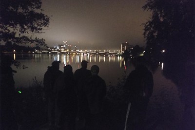 Participants scanning for bats along the Ume river. At night. Photo.