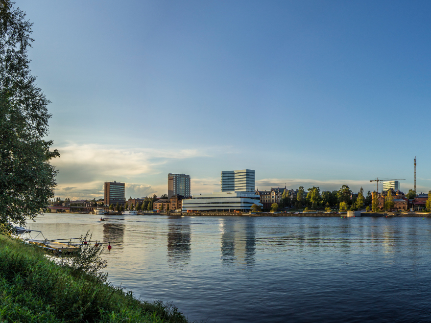 View over a city from waterside.