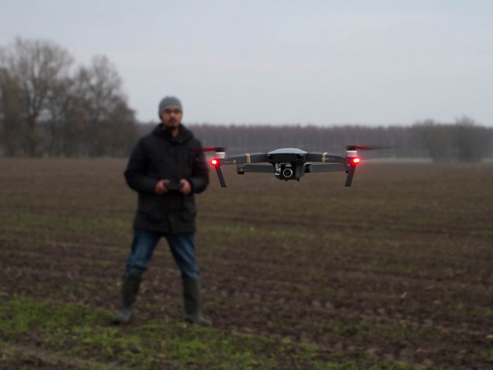 Drone in field. Photo.