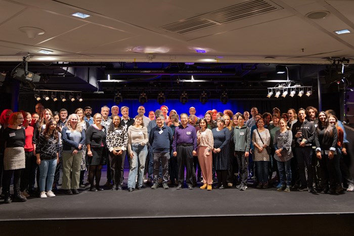 Group picture of participants during symposium. Photo. 